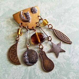 BEAUTIFUL VINTAGE SUSAN L RICHARDSON METAL BROOCH